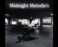 a man sitting on a chair in a parking lot with the words midnight melodies