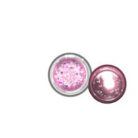 a pink glitter ball and a pink glitter ball on a black background