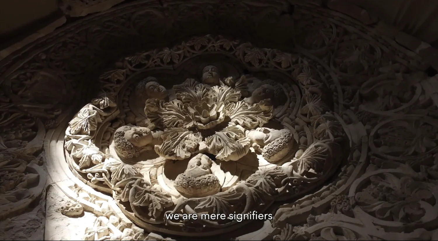 an ornate carving on the ceiling of a church
