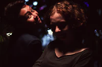 a woman and a man posing for a picture