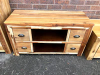a wooden tv stand with two drawers and two drawers