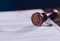 a rubber stamp sits on top of a piece of paper