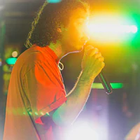 a man holding a microphone