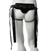 a mannequin wearing a black thong with straps