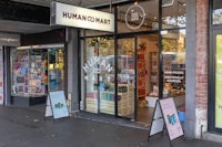a store with a sign that says humankind