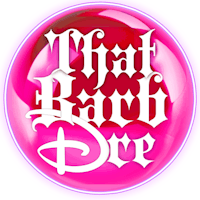 a pink circle with the words'that barbie doll'on it