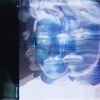 a photo of a man with a blue face