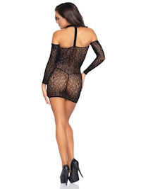 the back view of a woman in a black lace bodysuit
