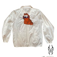 a white jacket with a cartoon cat on it