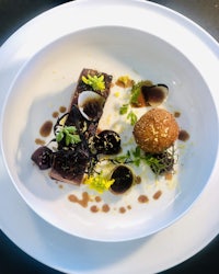 a white plate with a dish on it