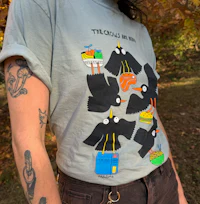 a woman wearing a t - shirt with crows on it