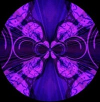 a purple and black circle with an abstract design