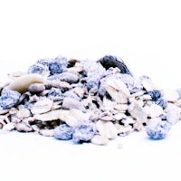 a pile of oats on a white background