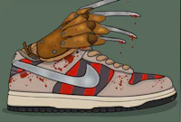 a pair of nike shoes with a hand holding a pair of claws