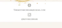 a business card with a gold glitter background