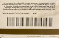the back of a credit card with a barcode on it