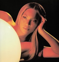 the cover of beyoncé's album with a woman laying on top of a ball