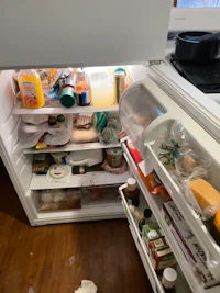 a refrigerator with a lot of food in it