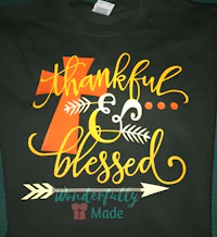 a black shirt with the words thankful and blessed on it
