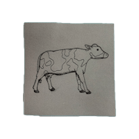 a black and white drawing of a cow on a piece of paper