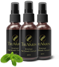 three bottles of truvarin hair growth formula with mint leaves