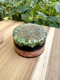 a box with a spiral on top of it