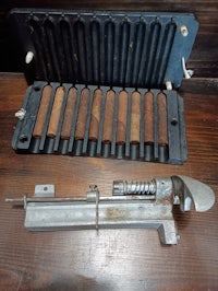 a box of cigar cutters on a wooden table