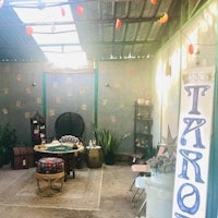 a room with a sign that says tarot
