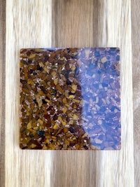 a piece of wood with a piece of glass on it