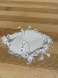 white powder on top of a wooden table