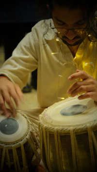 a man is playing a musical instrument
