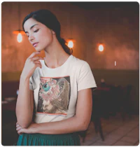 a woman wearing a t - shirt with a woman's face on it