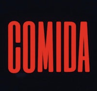 a red sign with the word comida on it