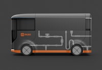 an orange and black vehicle with pipes on it