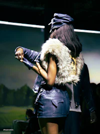 a woman wearing a leather jacket