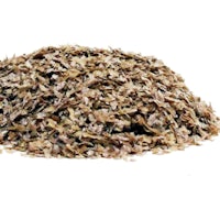 a pile of dried brown rice on a white background