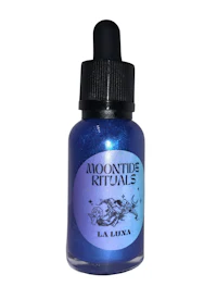 a bottle of moonstone rituel with a blue lid