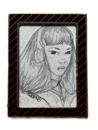 a drawing of a girl in a black frame