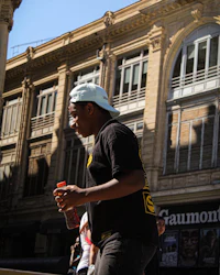 a man on a skateboard in front of a building