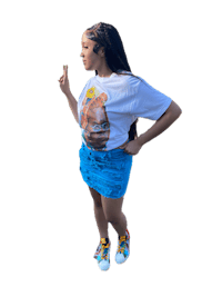 a woman wearing a t - shirt and blue skirt