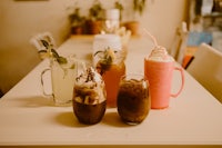 a table with a variety of drinks on it
