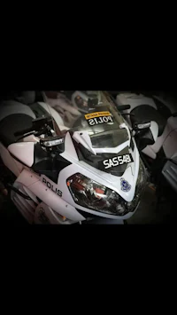 a police motorcycle is parked in a garage