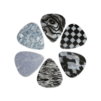 black and white guitar picks in a circle