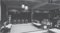 a black and white image of a restaurant