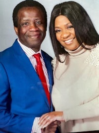 a man and woman posing for a picture