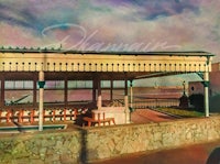 a painting of a gazebo on the beach