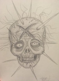 a drawing of a skull with spikes on it