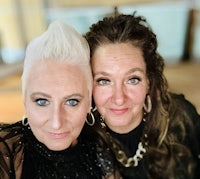 two women with white hair posing for a photo