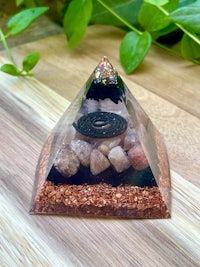 a pyramid with rocks and stones on top of it