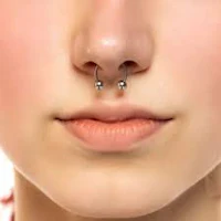 a woman with a nose piercing
